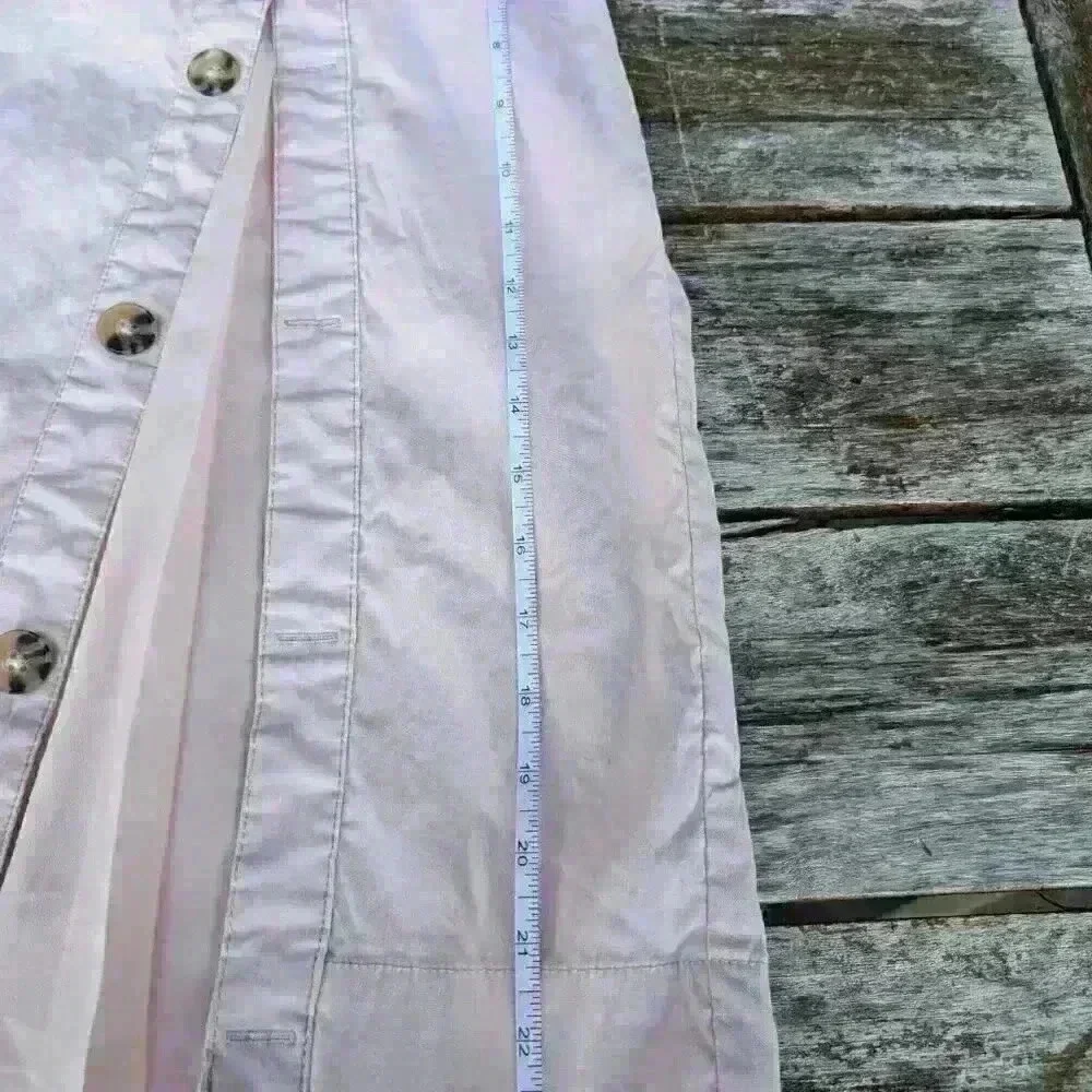 Super cute anthropology light pink linen skirt with faux thigh slit size 8